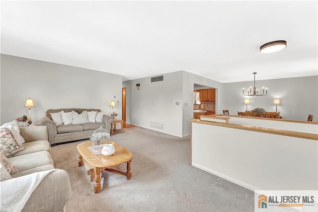 323 Green St, Woodbridge Proper, NJ 07095 - living area featuring a chandelier and light carpet