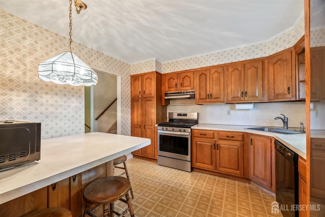 41 Winton Rd, East Brunswick, NJ 08816 - kitchen with stainless steel gas range oven, black dishwasher, wallpapered walls, a sink, and under cabinet range hood