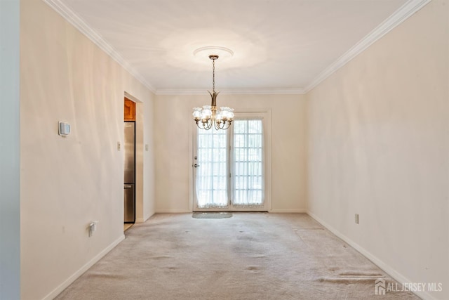 41 Winton Rd, East Brunswick, NJ 08816 - unfurnished room featuring ornamental molding, light colored carpet, a chandelier, and baseboards