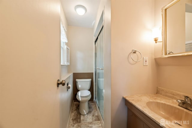 41 Winton Rd, East Brunswick, NJ 08816 - full bath with toilet, vanity, a shower with door, and baseboards