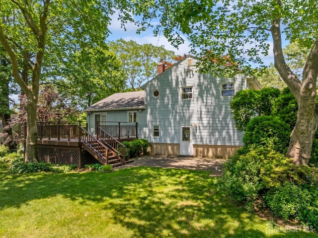 41 Winton Rd, East Brunswick, NJ 08816 - back of house with a wooden deck, a lawn, a chimney, stairs, and a patio area
