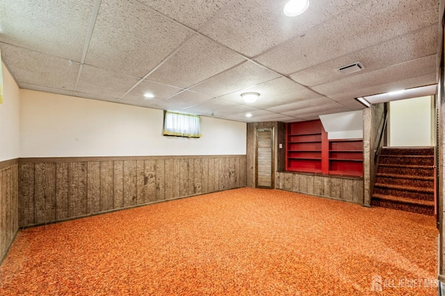 41 Winton Rd, East Brunswick, NJ 08816 - finished below grade area featuring a wainscoted wall, stairway, a drop ceiling, and carpet floors