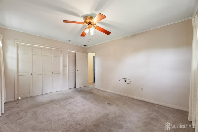 41 Winton Rd, East Brunswick, NJ 08816 - unfurnished bedroom featuring light colored carpet, baseboards, a closet, a ceiling fan, and crown molding