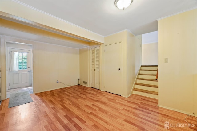 41 Winton Rd, East Brunswick, NJ 08816 - spare room featuring light wood-type flooring, stairs, crown molding, and baseboards