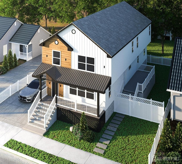 view of front facade with a porch, concrete driveway, board and batten siding, fence, and stairs