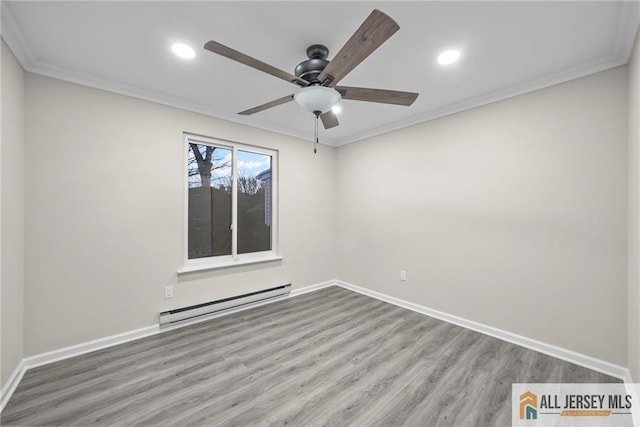 empty room with a baseboard heating unit, wood finished floors, recessed lighting, crown molding, and baseboards