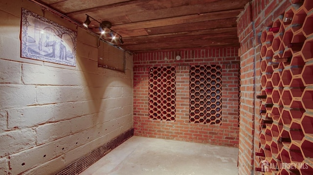 wine room with wooden ceiling