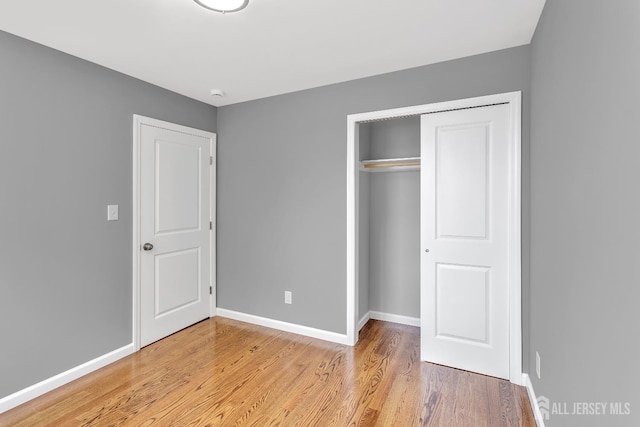 65 Bayview St, Aberdeen, NJ 07721 - unfurnished bedroom with light wood-style floors and a closet