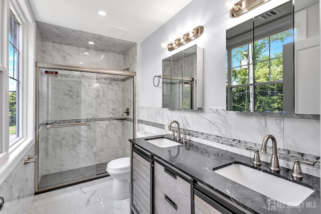 65 Bayview St, Aberdeen, NJ 07721 - full bath featuring tile walls, marble tiled floors, a stall shower, double vanity, and recessed lighting
