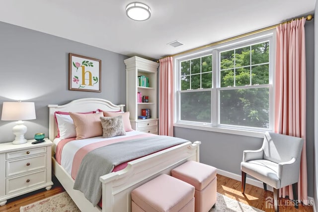 65 Bayview St, Aberdeen, NJ 07721 - bedroom featuring wood finished floors and baseboards