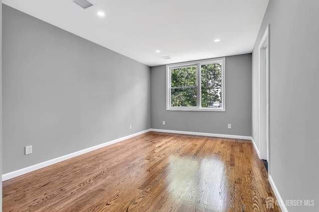 65 Bayview St, Aberdeen, NJ 07721 - unfurnished room featuring wood finished floors and recessed lighting
