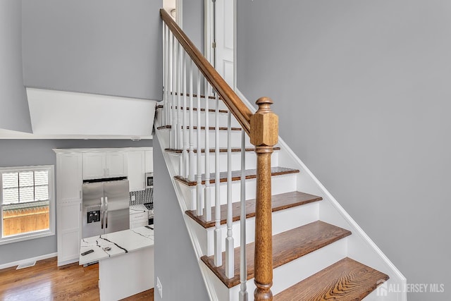 65 Bayview St, Aberdeen, NJ 07721 - stairs featuring wood finished floors and baseboards