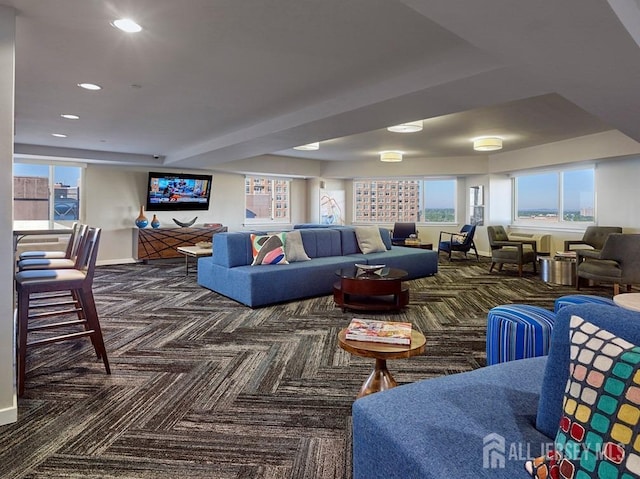 living room with carpet flooring, recessed lighting, and baseboards