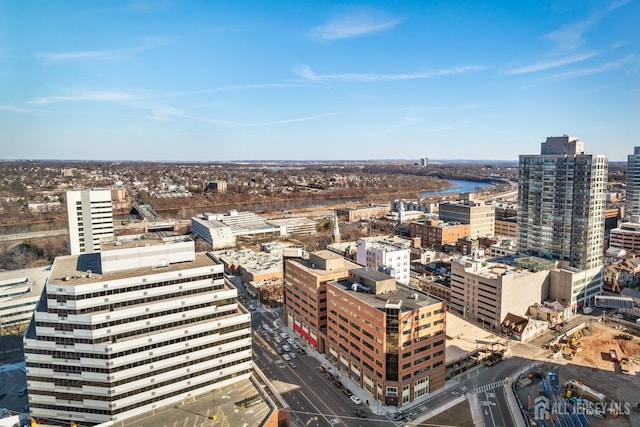 property's view of city featuring a water view