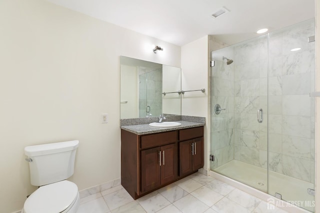 full bathroom with visible vents, toilet, marble finish floor, a stall shower, and vanity