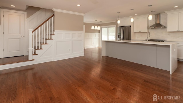 234 Rose St, Metuchen, NJ 08840 - kitchen with stainless steel refrigerator with ice dispenser, wall chimney range hood, a decorative wall, light countertops, and dark wood-style floors