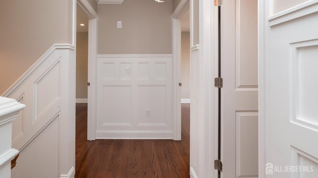 hall with dark wood-style floors