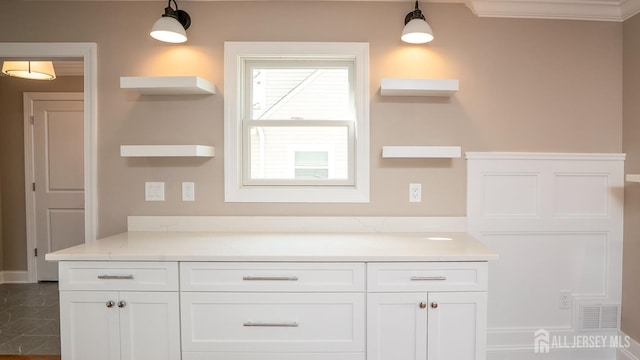 234 Rose St, Metuchen, NJ 08840 - kitchen with open shelves, white cabinetry, light countertops, hanging light fixtures, and ornamental molding