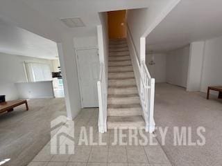 284 Brookfield Dr, Jackson, NJ 08527 - stairway with carpet floors