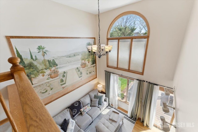 675 Raritan Rd, Clark, NJ 07066 - living area with a chandelier, plenty of natural light, and light wood finished floors
