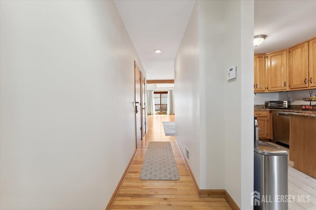 675 Raritan Rd, Clark, NJ 07066 - hallway featuring baseboards, light wood-style flooring, and recessed lighting