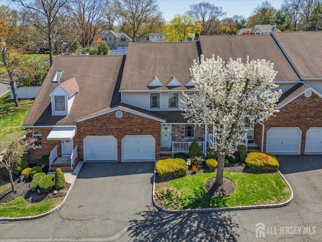 675 Raritan Rd, Clark, NJ 07066 - view of front of home with asphalt driveway and a porch