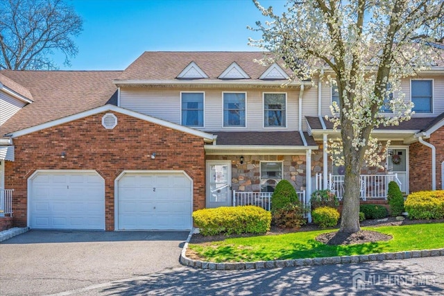 675 Raritan Rd, Clark, NJ 07066 - view of front of house featuring driveway, a porch, an attached garage, and a shingled roof