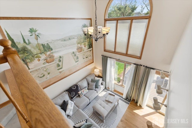 675 Raritan Rd, Clark, NJ 07066 - living room featuring a chandelier and wood finished floors