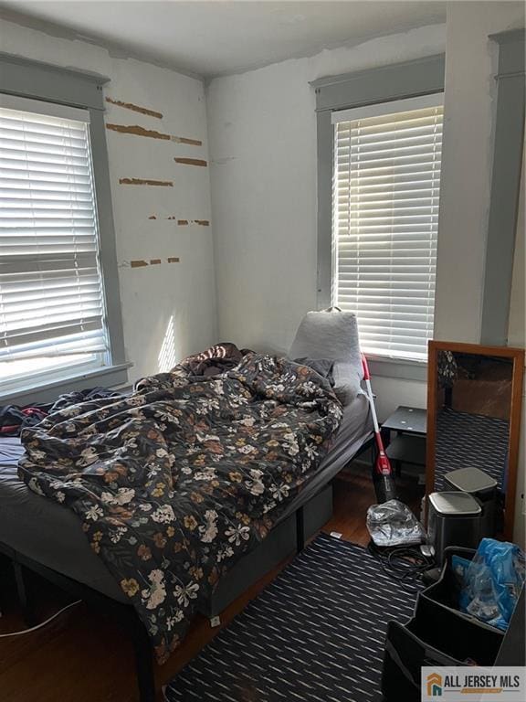 bedroom featuring wood finished floors