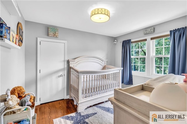 11 Donna St, East Brunswick, NJ 08816 - bedroom with wood finished floors and a nursery area