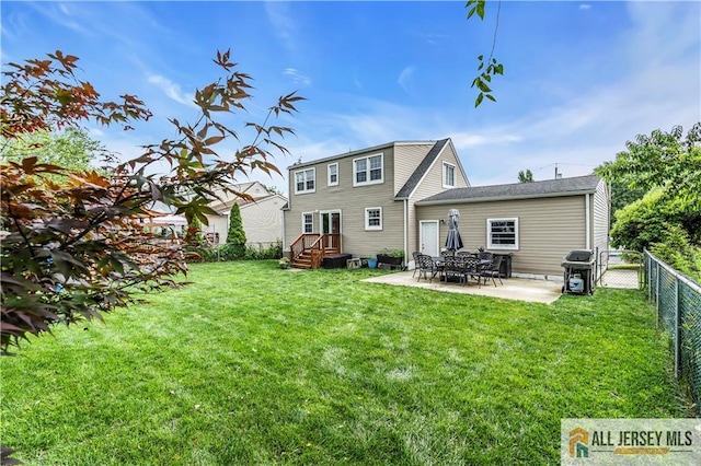 11 Donna St, East Brunswick, NJ 08816 - rear view of property with a fenced backyard and a patio