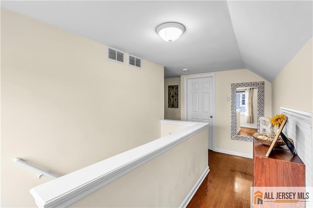 11 Donna St, East Brunswick, NJ 08816 - hallway featuring dark wood-type flooring and lofted ceiling