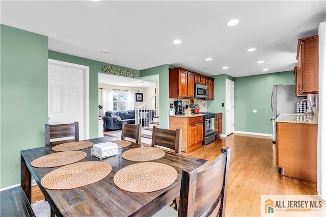 11 Donna St, East Brunswick, NJ 08816 - dining space with light wood-type flooring, recessed lighting, and stairway