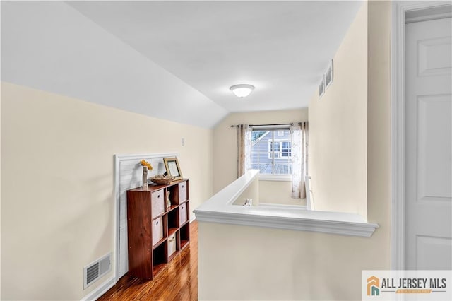 11 Donna St, East Brunswick, NJ 08816 - corridor featuring wood finished floors and lofted ceiling