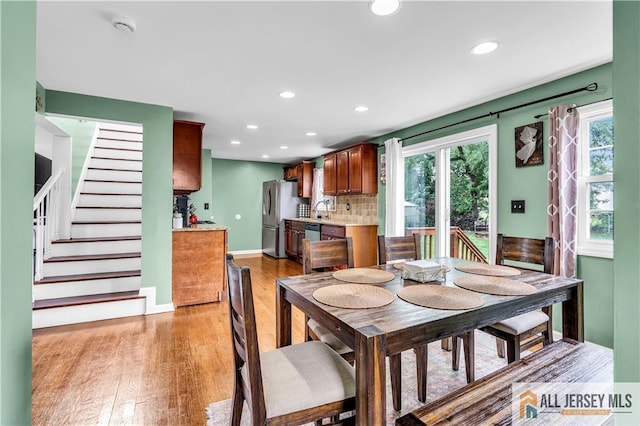 11 Donna St, East Brunswick, NJ 08816 - dining space with recessed lighting, light wood-type flooring, stairway, and plenty of natural light