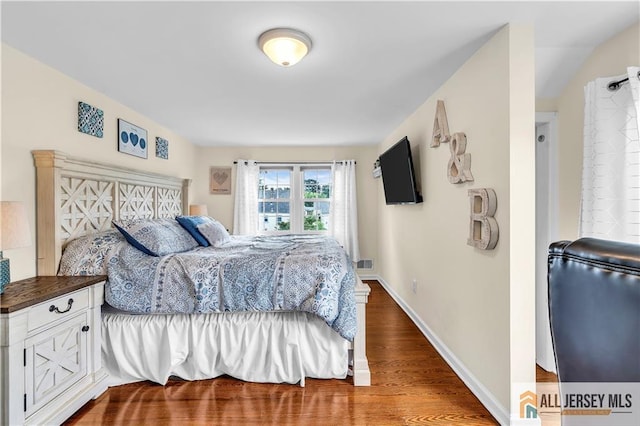 11 Donna St, East Brunswick, NJ 08816 - bedroom featuring wood finished floors and baseboards