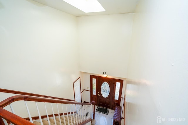 entrance foyer with a skylight