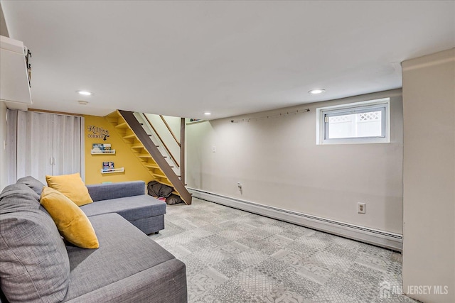 carpeted living room featuring a baseboard radiator