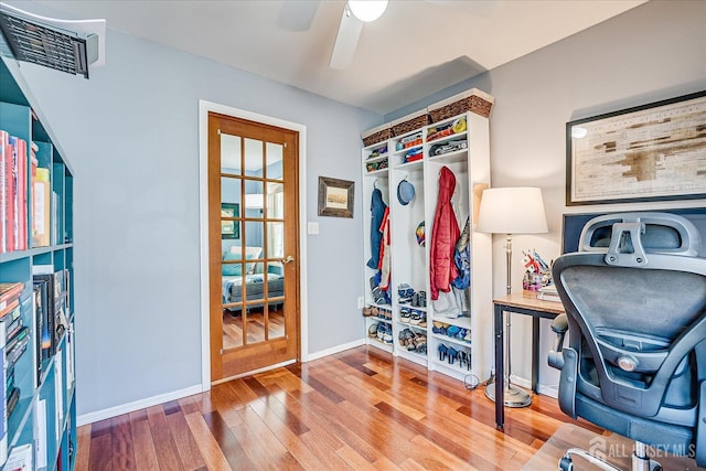 mudroom featuring ceiling fan and hardwood / wood-style floors