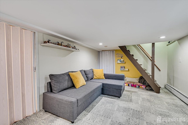 carpeted living room featuring a baseboard radiator