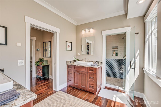 28 Evans Dr, Cranbury, NJ 08512 - full bathroom with tiled shower, wood finished floors, vanity, baseboards, and recessed lighting