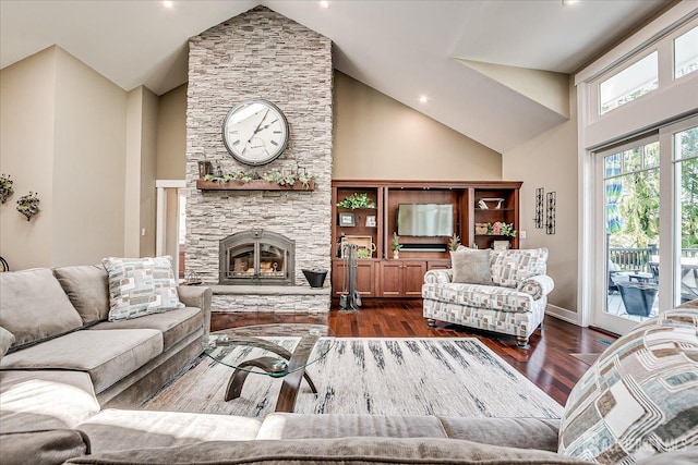 28 Evans Dr, Cranbury, NJ 08512 - living area featuring high vaulted ceiling, dark wood finished floors, a fireplace, and baseboards