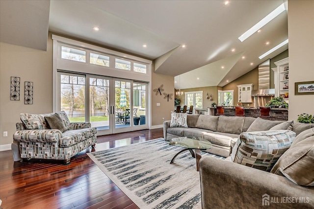 28 Evans Dr, Cranbury, NJ 08512 - living area with dark wood-style floors, plenty of natural light, baseboards, recessed lighting, and high vaulted ceiling