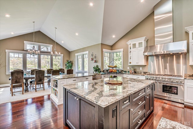 28 Evans Dr, Cranbury, NJ 08512 - kitchen featuring double oven range, a chandelier, wall chimney exhaust hood, dark wood-style flooring, and high vaulted ceiling