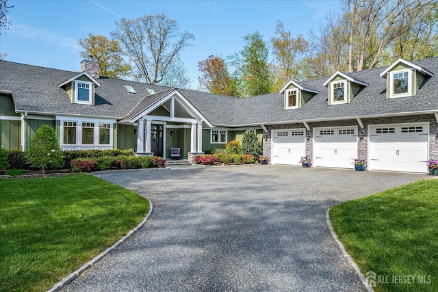 28 Evans Dr, Cranbury, NJ 08512 - new england style home with asphalt driveway, roof with shingles, an attached garage, and a chimney