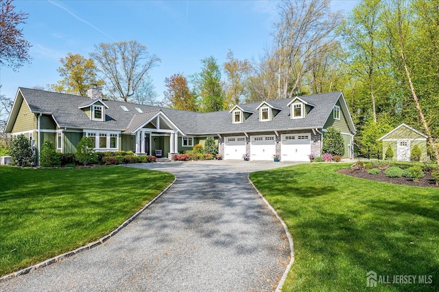 28 Evans Dr, Cranbury, NJ 08512 - view of front of home with driveway, a front yard, an attached garage, board and batten siding, and a chimney