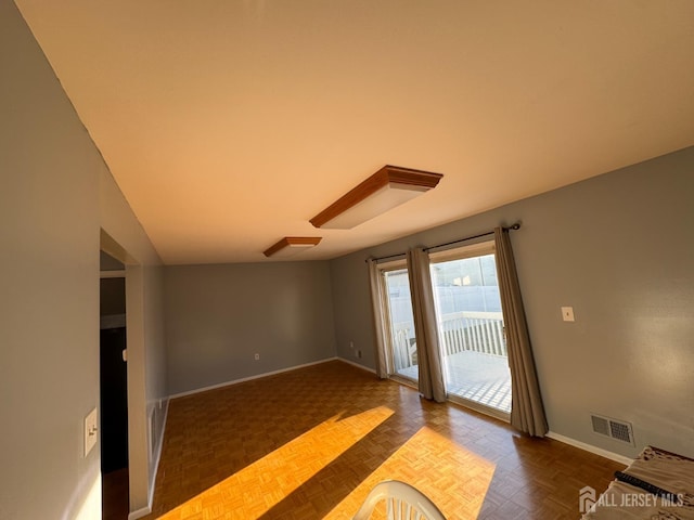 interior space with dark parquet floors