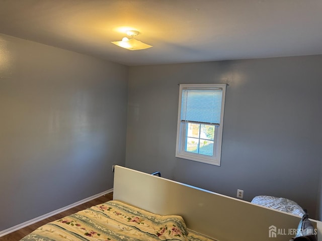 bedroom featuring hardwood / wood-style flooring