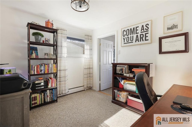 office area with a baseboard heating unit