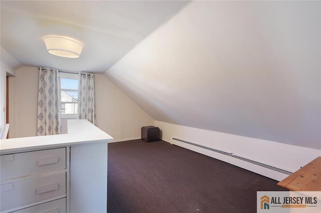 additional living space featuring lofted ceiling, a baseboard radiator, baseboards, and dark colored carpet